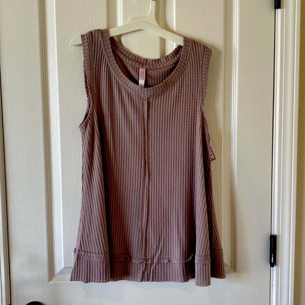 New with tag. Sleep shirt. Soft, waffle like material. Medium